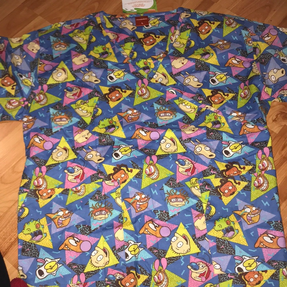 Nickelodeon scrub top. Size large